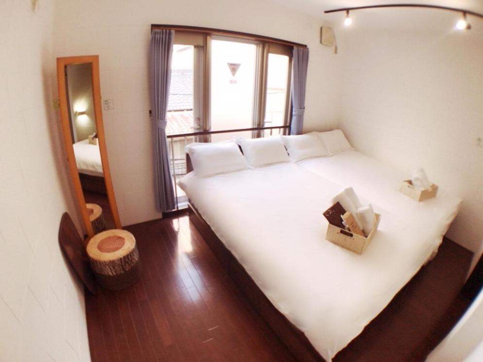 Osaka Sinsei Guest House מראה חיצוני תמונה